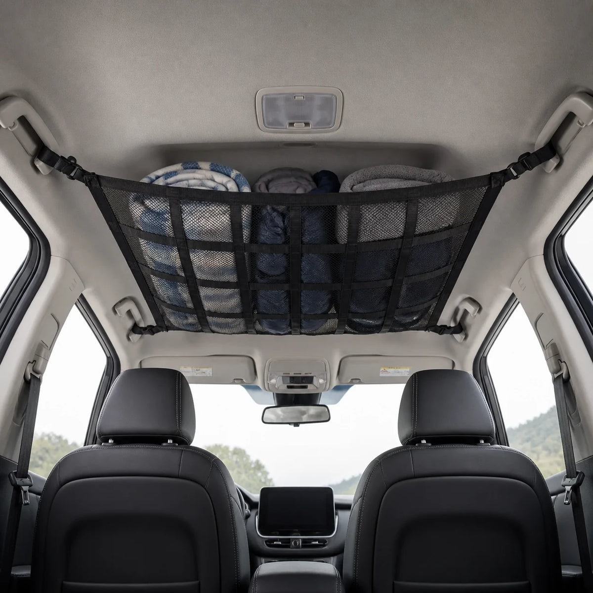 Overhead cargo net installed in an SUV with soft travel gear stored above clear seats