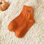 Pumpkin design on burnt orange